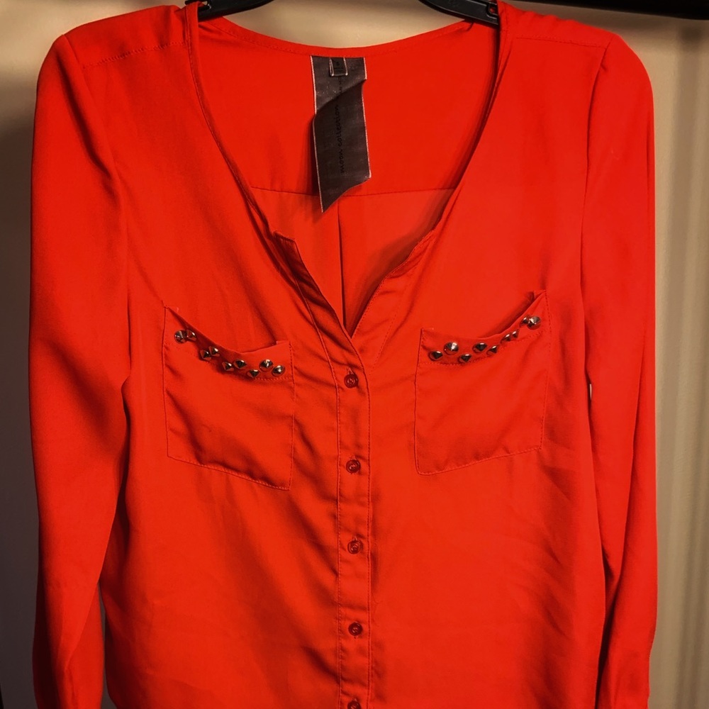 Red blouse studded detail